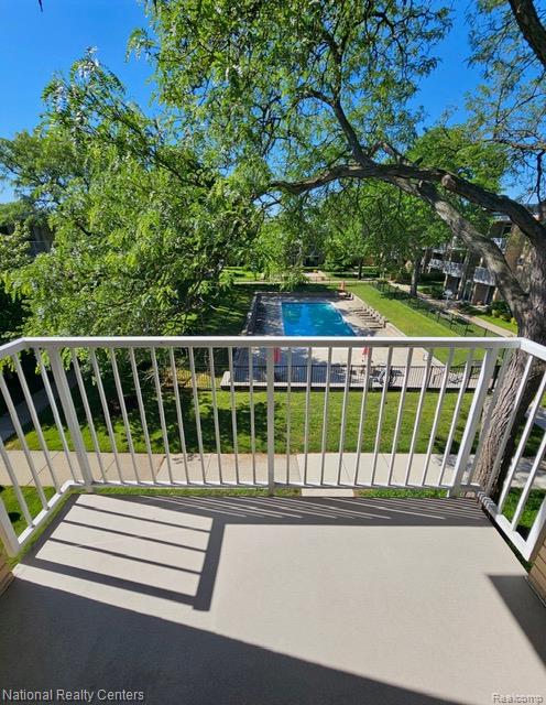 4913 Crooks Road, Unit G5 Royal Oak, MI 48073 - Photo 14 of 16 area surrounded by manicured lawns and mature trees