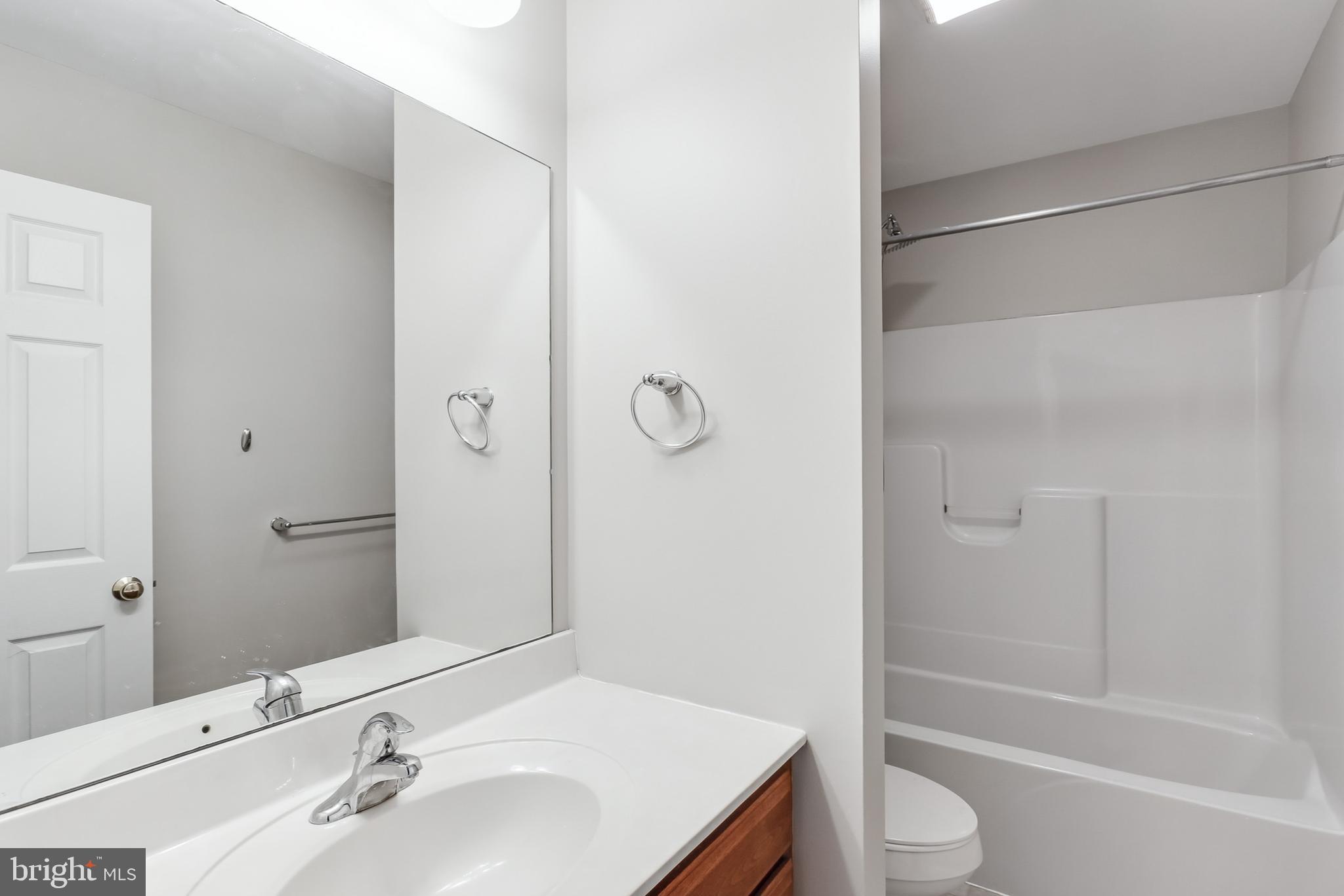 2500 Mill Road, Unit 7 Mechanicsburg, PA 17055 - Photo 8 of 11 a bathroom with a sink toilet and shower