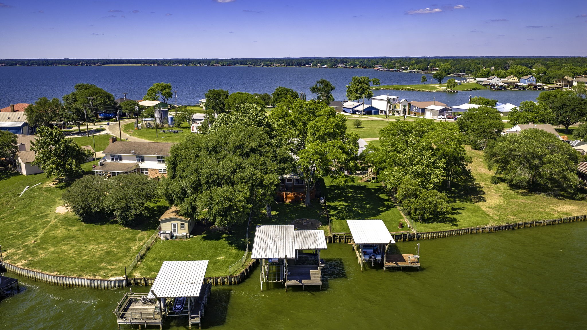 536 Weavers Cove Road Livingston, TX 77351 - Photo 35 of 44 an aerial view of a houses with a lake view