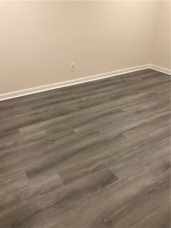 3071 Colonial Way, Unit K Atlanta, GA 30341 - Photo 5 of 20 wooden floor in empty room