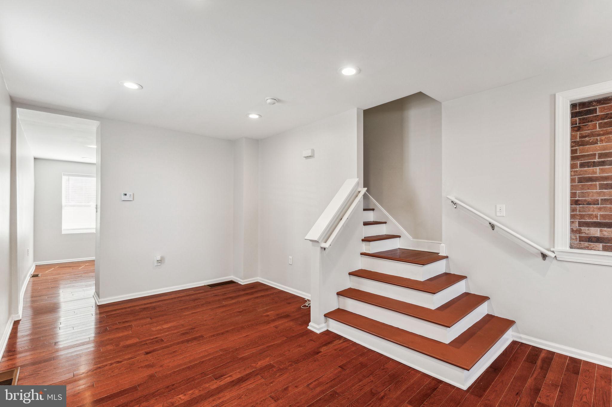 3131 Edgemont Street Philadelphia, PA 19134 - Photo 13 of 39 a view of entryway and hall with wooden floor