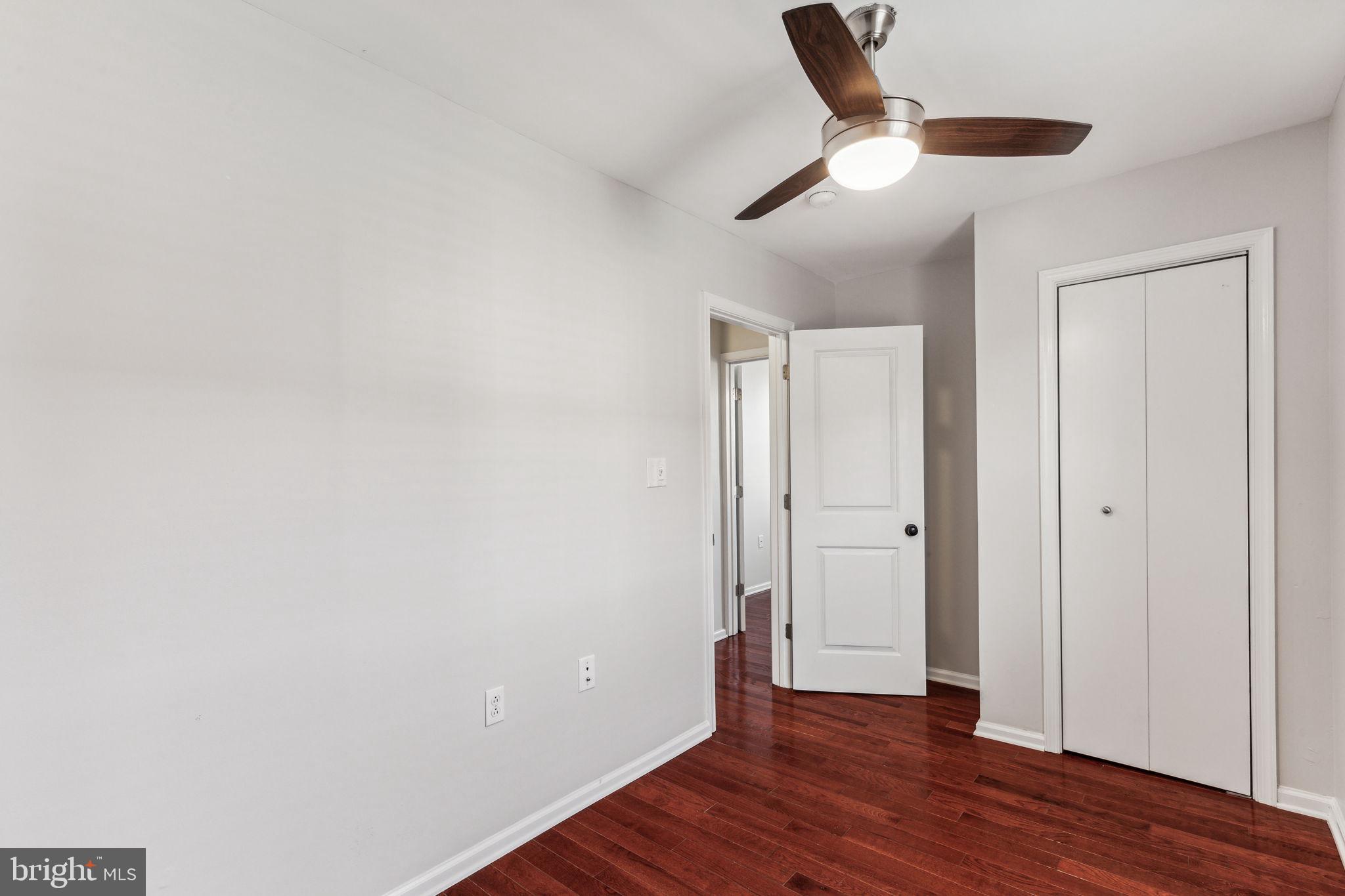3131 Edgemont Street Philadelphia, PA 19134 - Photo 36 of 39 a view of an empty room with wooden floor