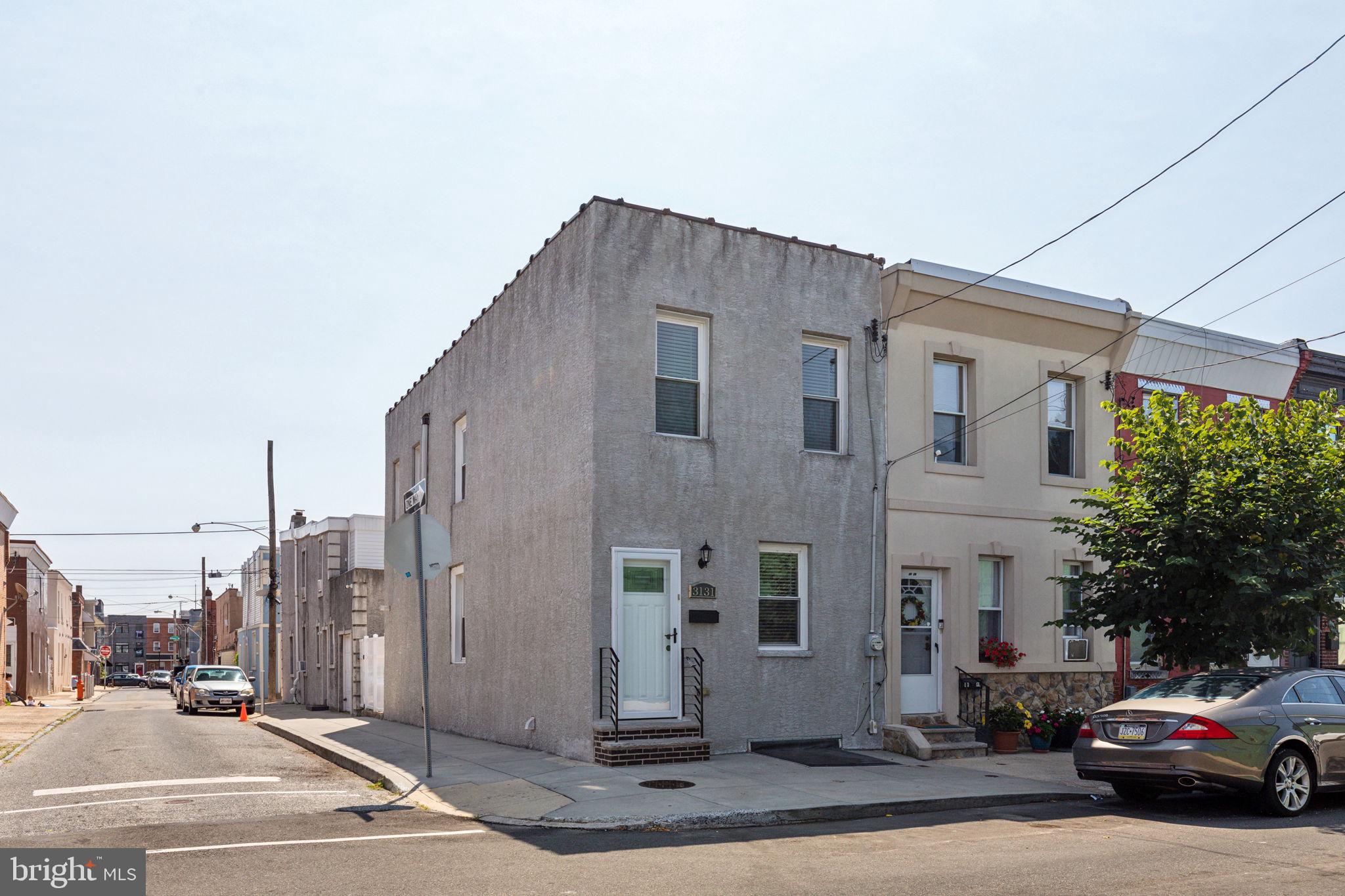 3131 Edgemont Street Philadelphia, PA 19134 - Photo 4 of 39 a car parked in front of a building