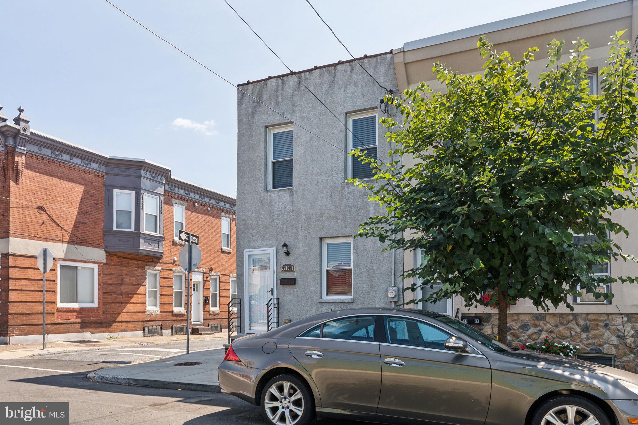 3131 Edgemont Street Philadelphia, PA 19134 - Photo 5 of 39 a view of a car parked in front of a house