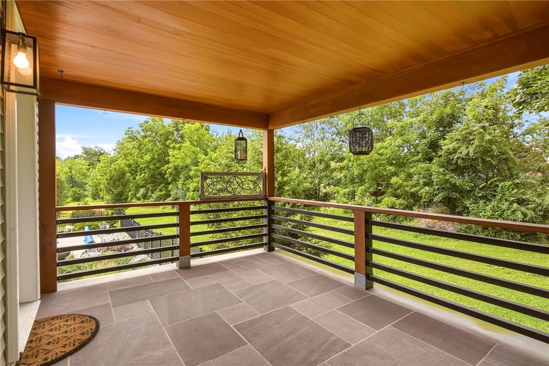 463 North Penn Dixie Road Bath, PA 18014 - Photo 70 of 86 An inviting covered patio offers tranquil views of the verdant landscape and private pool.