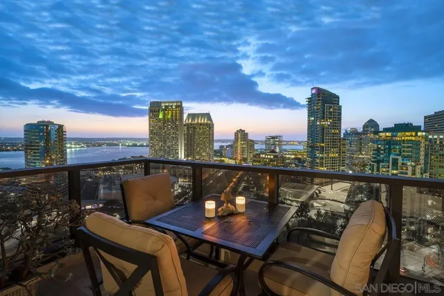 a view of a balcony with city view