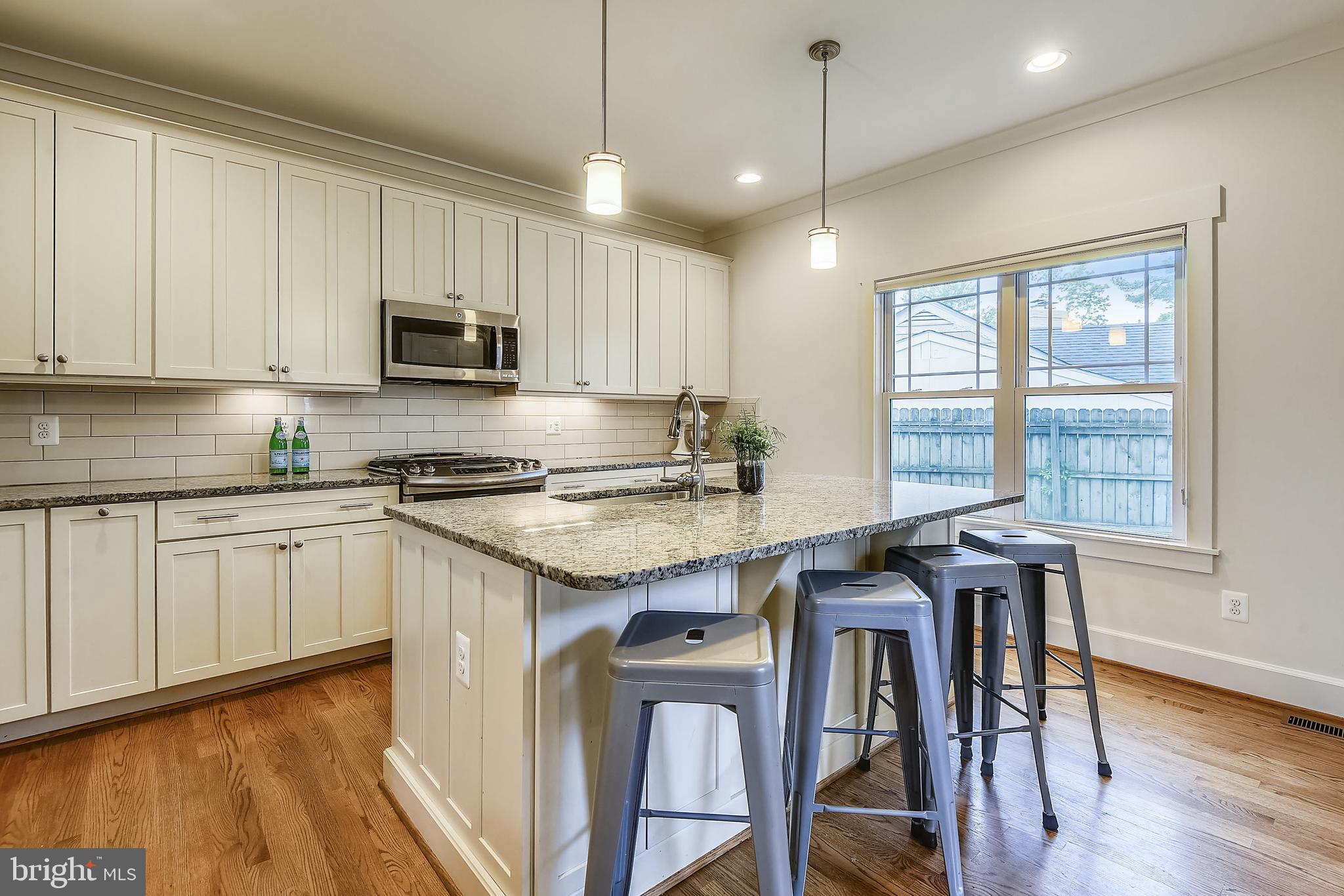 8046 Washington Road Alexandria, VA 22308 - Photo 16 of 50 Beautiful white kitchen with granite countertops