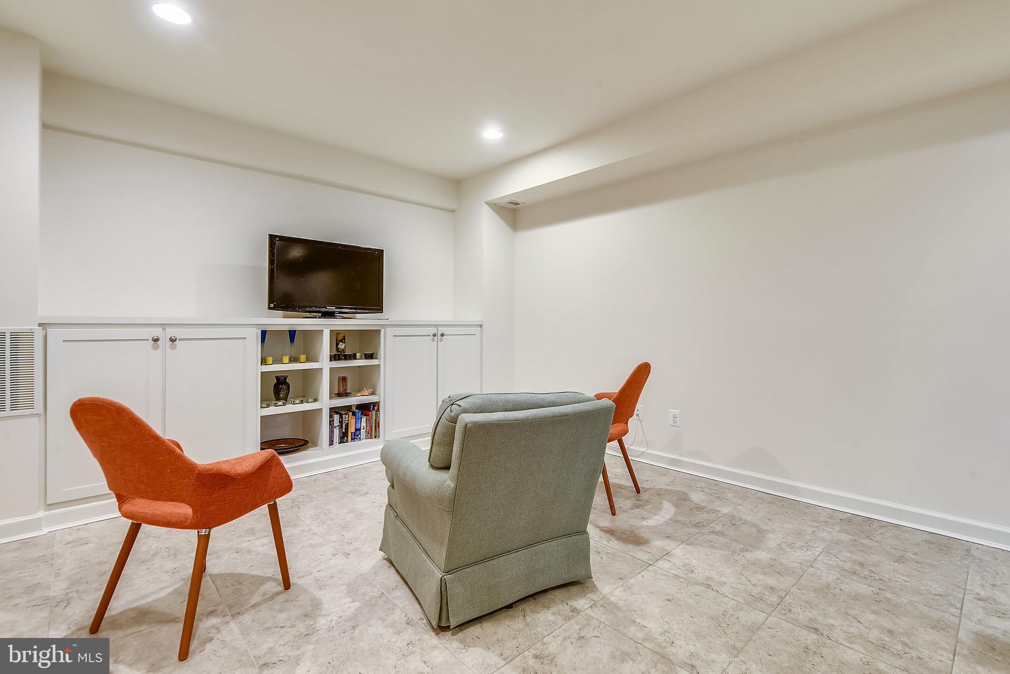 8046 Washington Road Alexandria, VA 22308 - Photo 35 of 50 Lower Level Rec Room with built ins