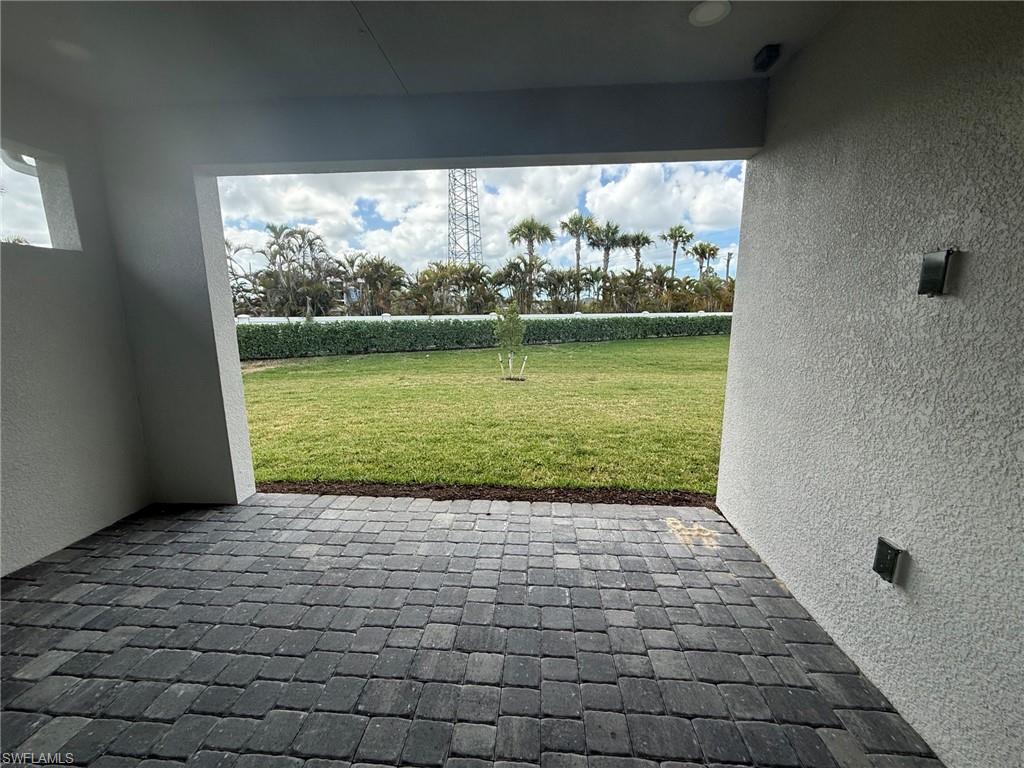 8909 Oceana Way Naples, FL 34114 - Photo 13 of 41 a view of an ocean from a balcony