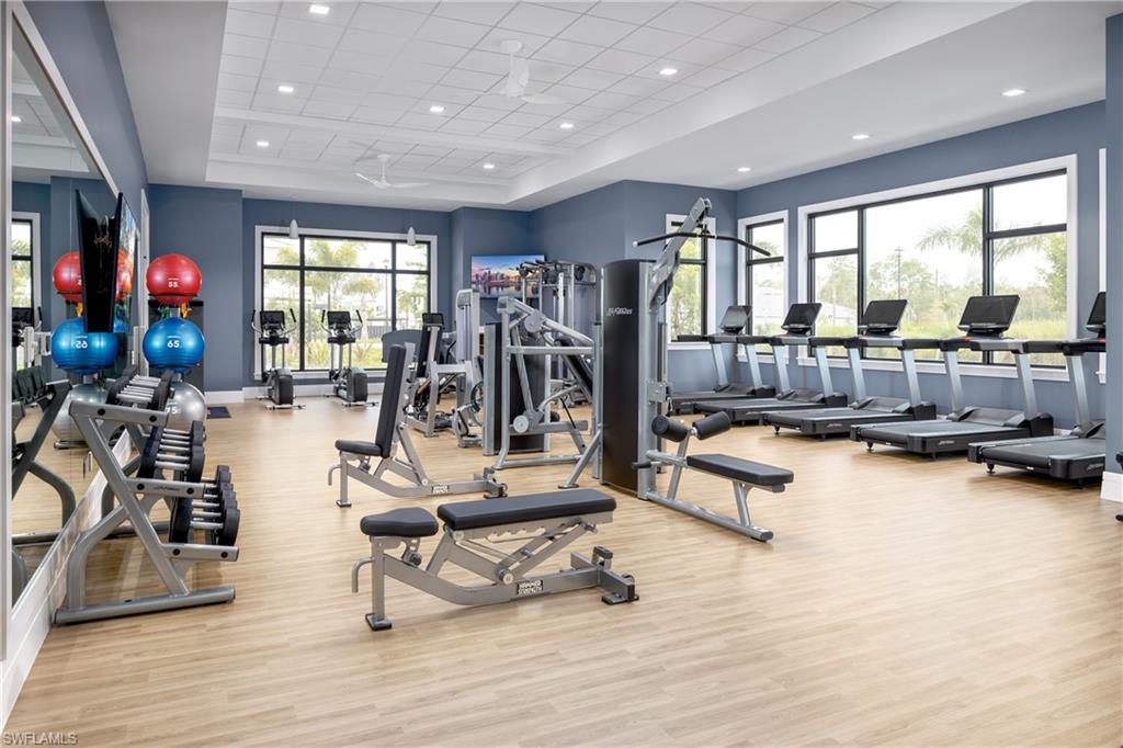 8909 Oceana Way Naples, FL 34114 - Photo 35 of 41 a view of a room with gym equipment