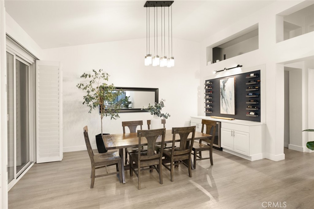 2531 Cottage Drive Corona, CA 92881 - Photo 11 of 48 a view of a dining room with furniture and chandelier