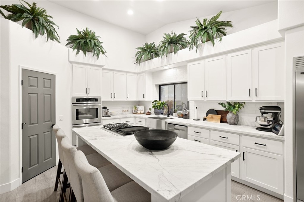 2531 Cottage Drive Corona, CA 92881 - Photo 18 of 48 a kitchen with appliances a counter and cabinets