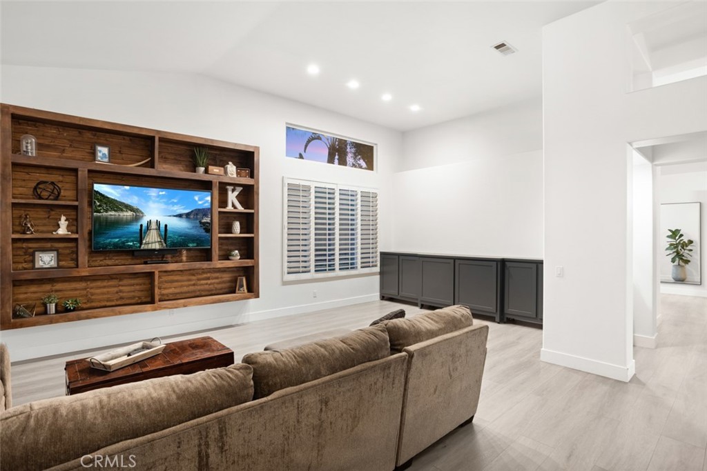 2531 Cottage Drive Corona, CA 92881 - Photo 2 of 48 a living room with furniture and a flat screen tv