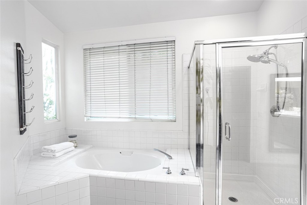 2531 Cottage Drive Corona, CA 92881 - Photo 24 of 48 a bathroom with a bathtub and a shower