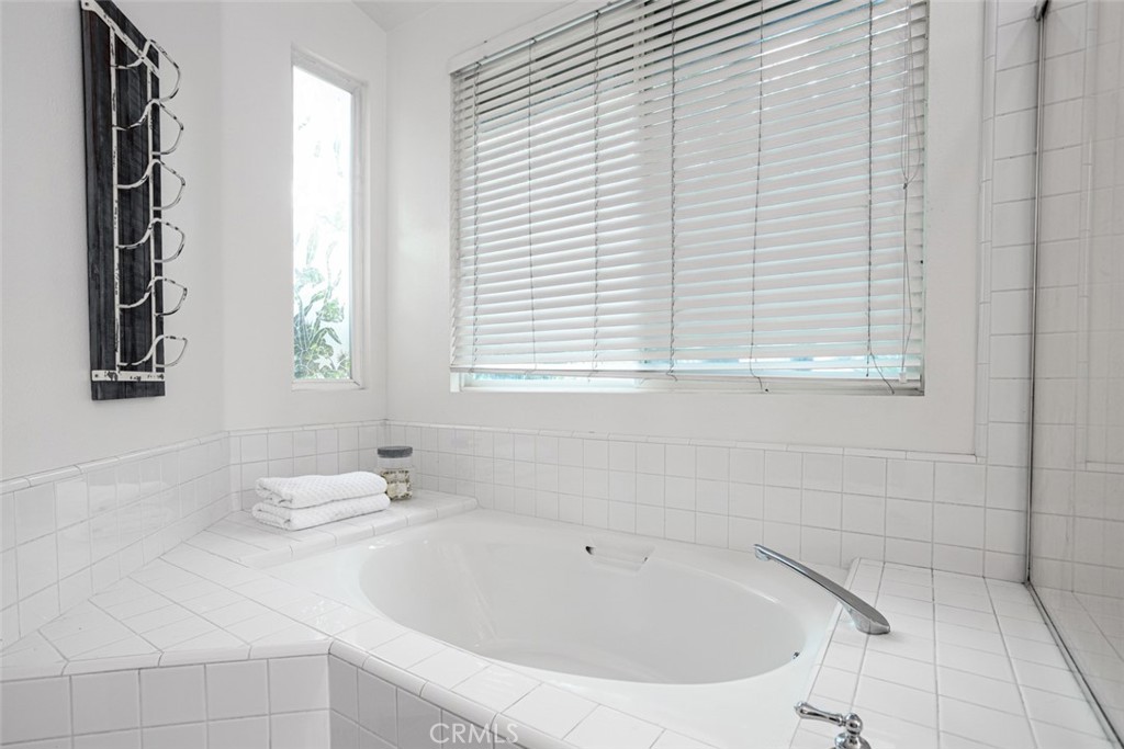 2531 Cottage Drive Corona, CA 92881 - Photo 25 of 48 a white bath tub sitting next to a white sink