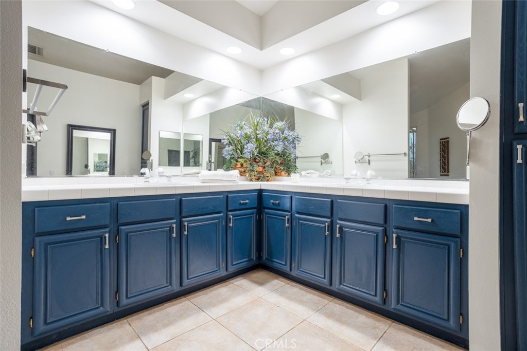 2531 Cottage Drive Corona, CA 92881 - Photo 26 of 48 a bathroom with a double vanity sink and a mirror