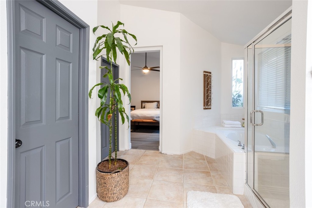 2531 Cottage Drive Corona, CA 92881 - Photo 27 of 48 a vase of flowers sitting next to a window