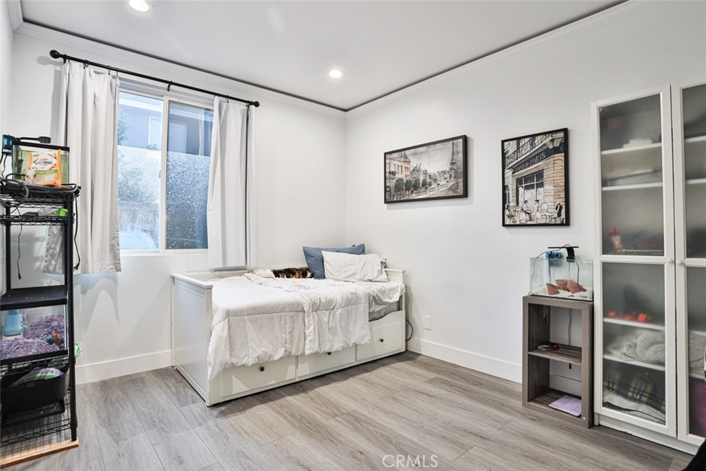 2531 Cottage Drive Corona, CA 92881 - Photo 28 of 48 a room with a bed and a flat screen tv