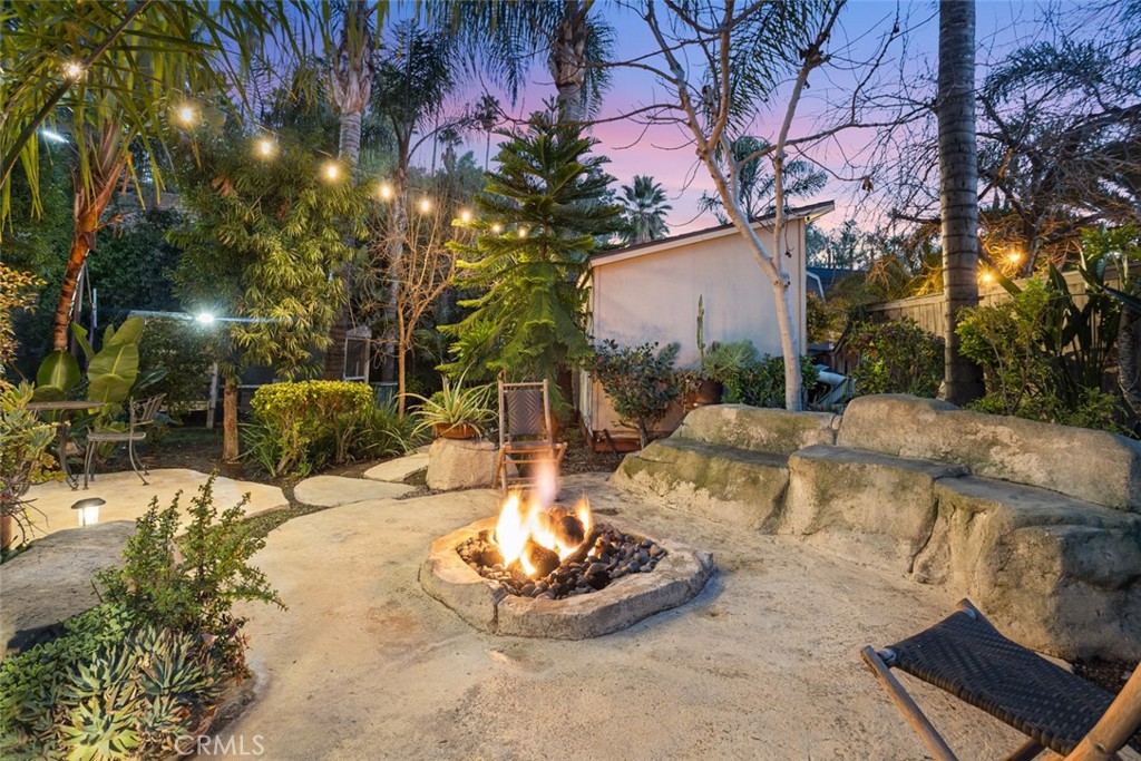 2531 Cottage Drive Corona, CA 92881 - Photo 38 of 48 a view of a backyard with a fountain