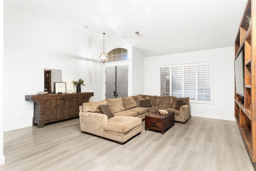 2531 Cottage Drive Corona, CA 92881 - Photo 5 of 48 a living room with furniture and a flat screen tv