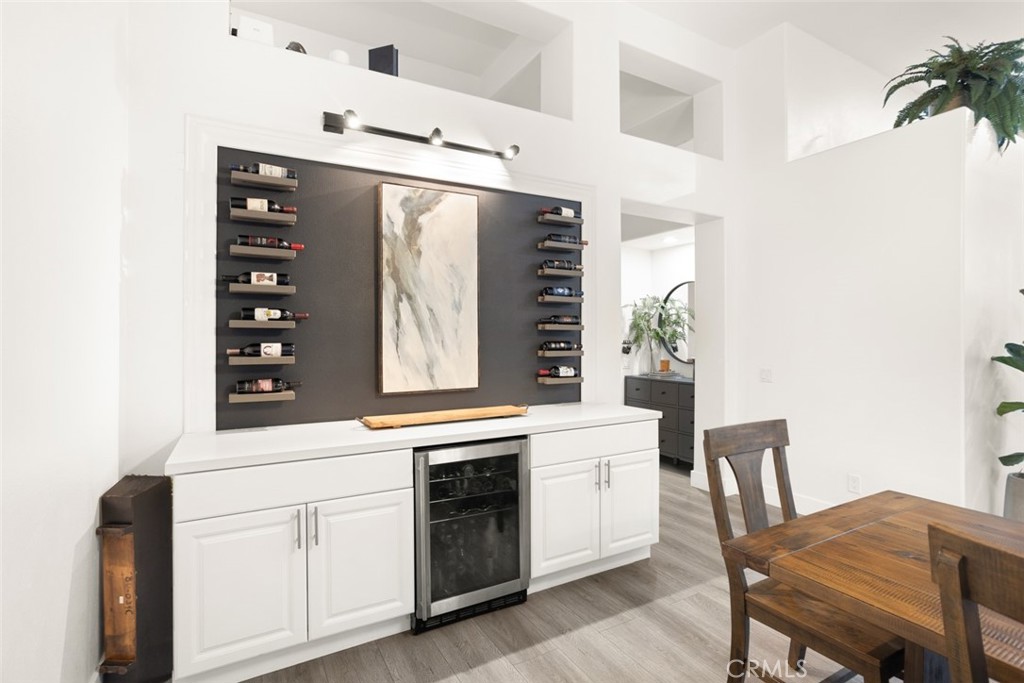 2531 Cottage Drive Corona, CA 92881 - Photo 9 of 48 a kitchen with a stove a sink and cabinets