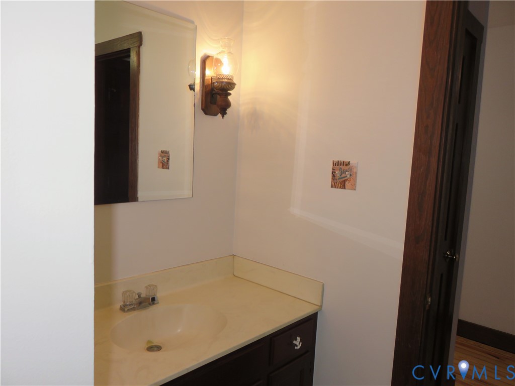 4261 Old Buckingham Road Powhatan, VA 23139 - Photo 15 of 23 a bathroom with a tub and shower