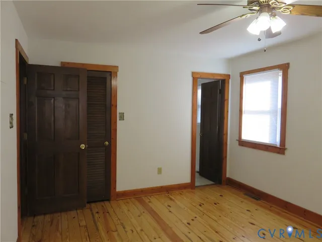 a bathroom with a shower and a toilet