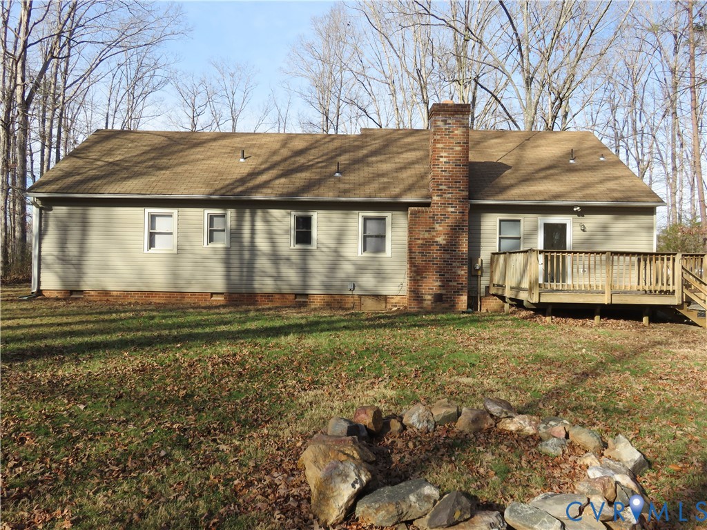 4261 Old Buckingham Road Powhatan, VA 23139 - Photo 21 of 23 a view of a house with a yard