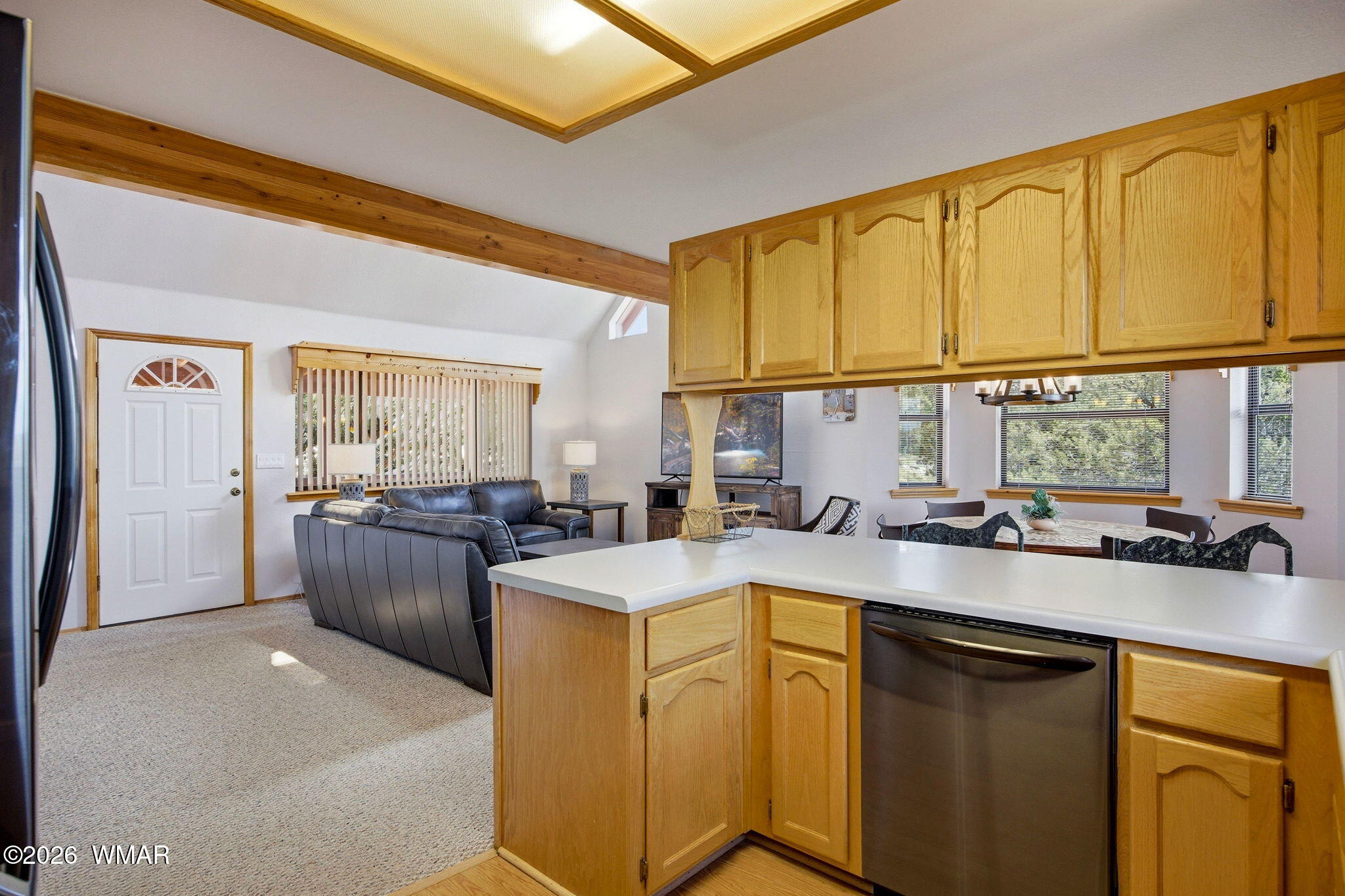 2806 Sky Hawk Drive Overgaard, AZ 85933 - Photo 15 of 43 a kitchen with a sink stove and cabinets