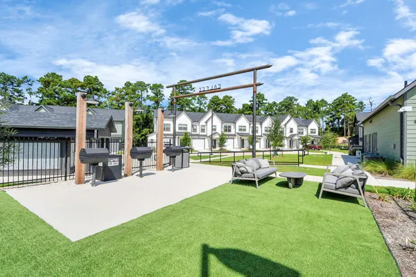 a bathroom with a granite countertop sink toilet a shower and a mirror