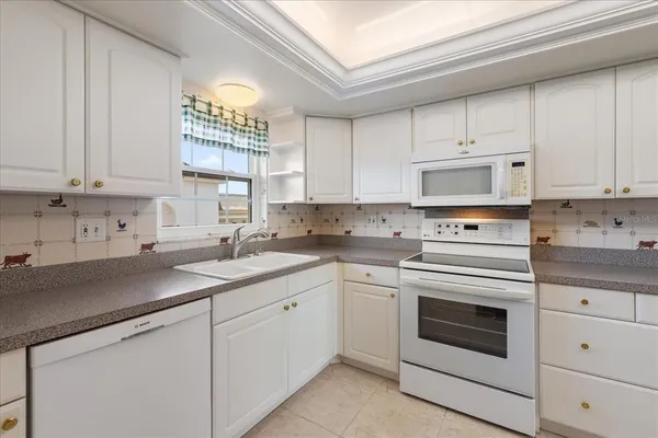 $350,000 | 139 Bluff View Drive, Unit 405, Belleair Bluffs, FL 33770