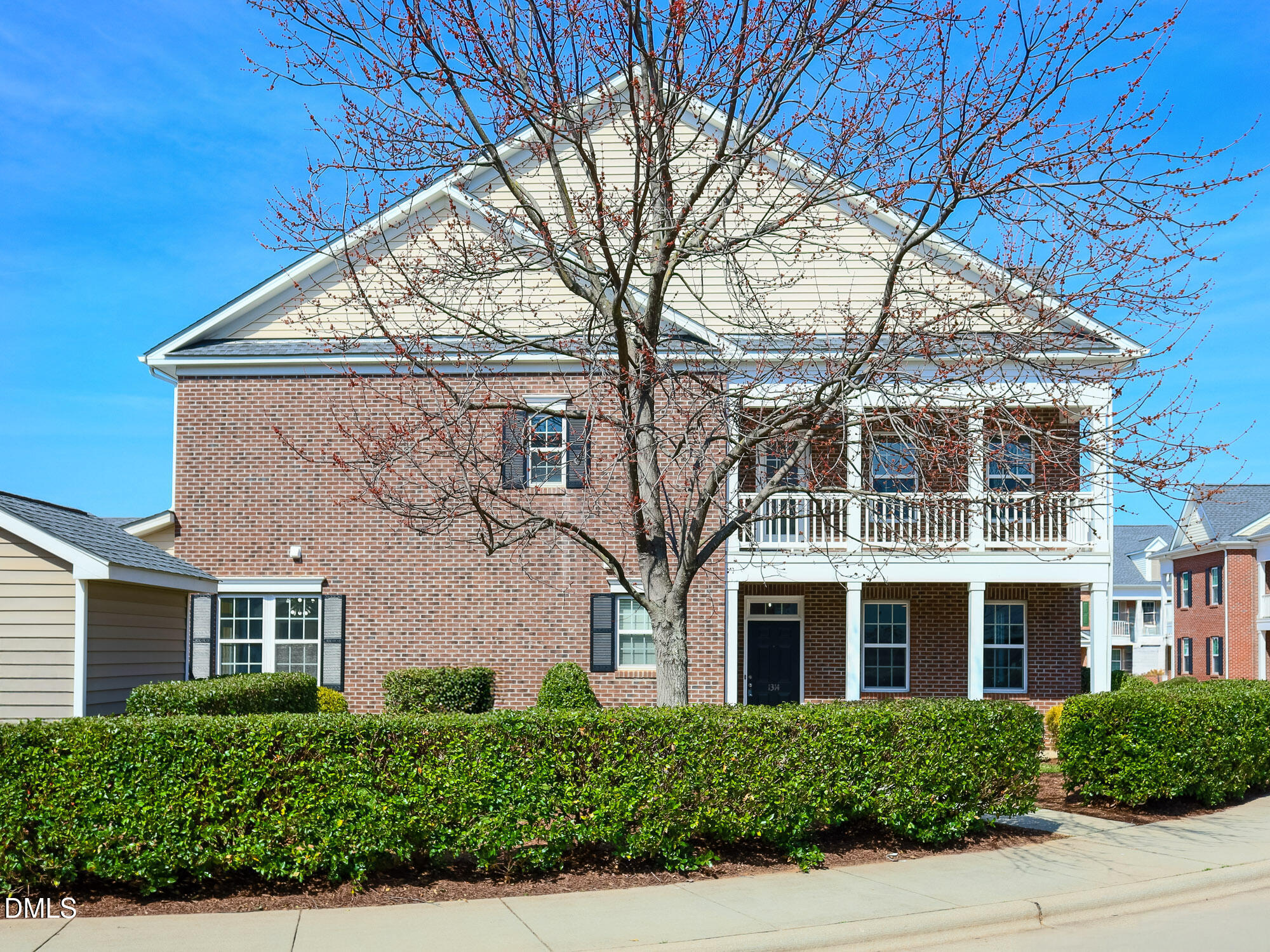 1314 Still Monument Way Raleigh, NC 27603 - Photo 1 of 25 a front view of a house with a yard