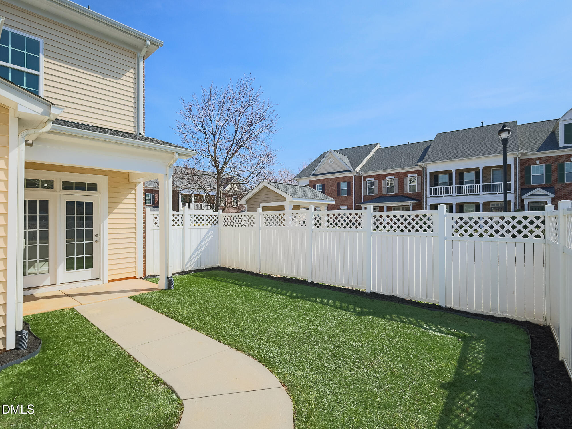 1314 Still Monument Way Raleigh, NC 27603 - Photo 21 of 25 a front view of a house with a garden