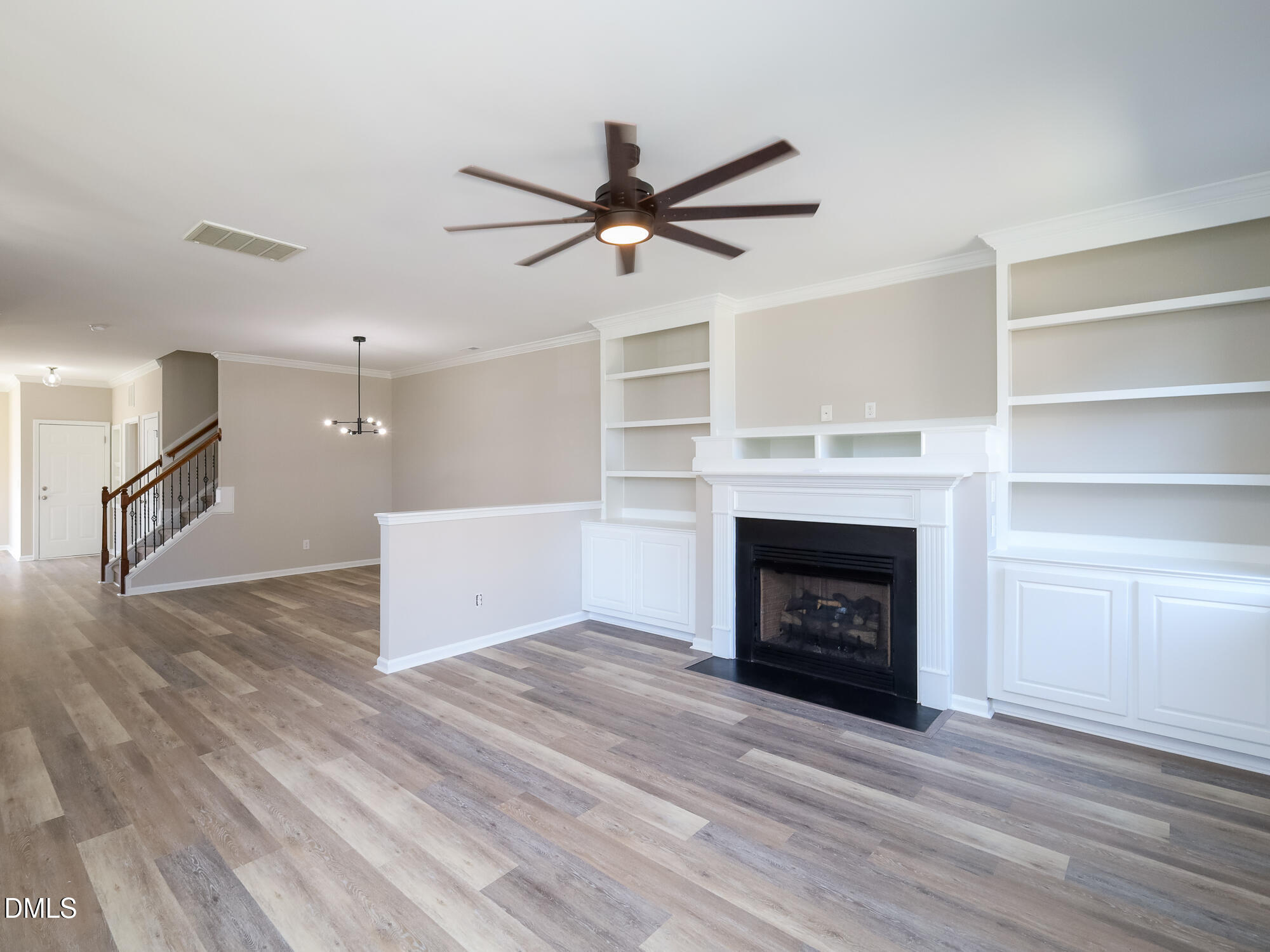 1314 Still Monument Way Raleigh, NC 27603 - Photo 6 of 25 a view of a livingroom with a fireplace and window