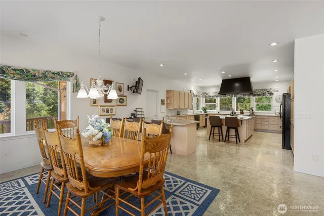 a view of a dining room with furniture
