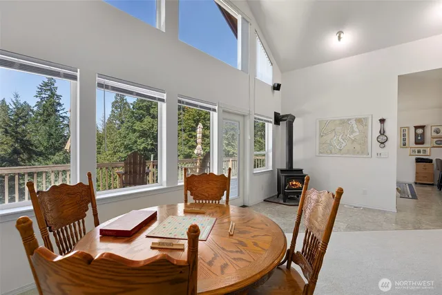a view of a dining room with furniture window and outside view