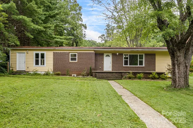 front view of a house and a yard