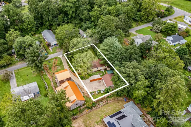 an aerial view of a house with pool outdoor seating and entertaining space