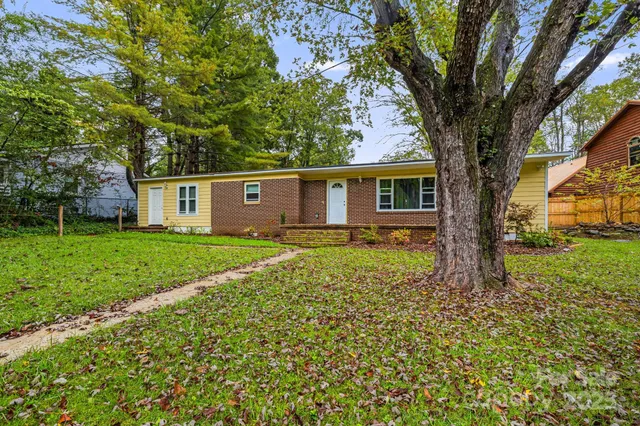 a house view with a garden space