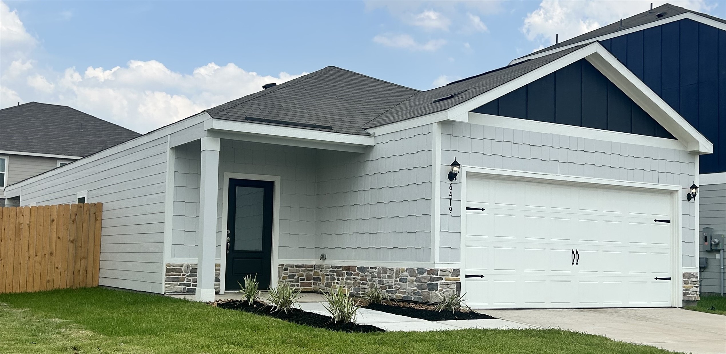 6419 Winter Elm Street Houston, TX 77048 - Photo 7 of 7 a view of a house with a yard