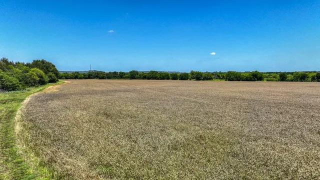 a view of an ocean and mountain
