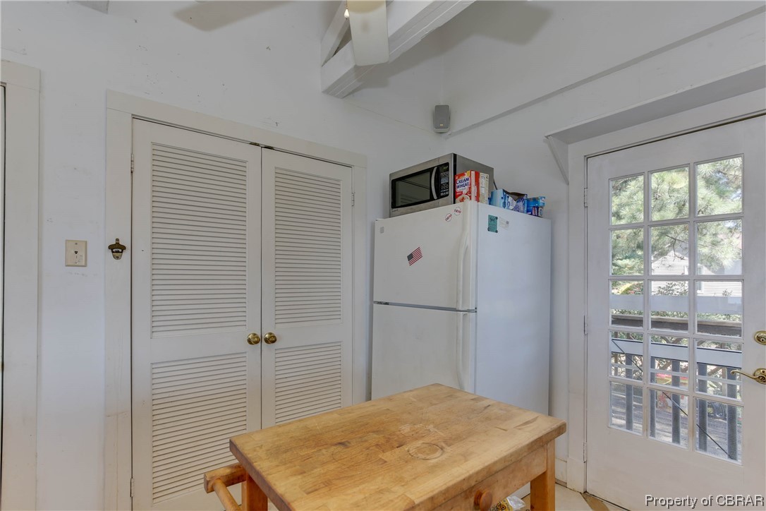 5403 Ark Road Gloucester, VA 23061 - Photo 19 of 50 Kitchen with white fridge and stainless steel microwave