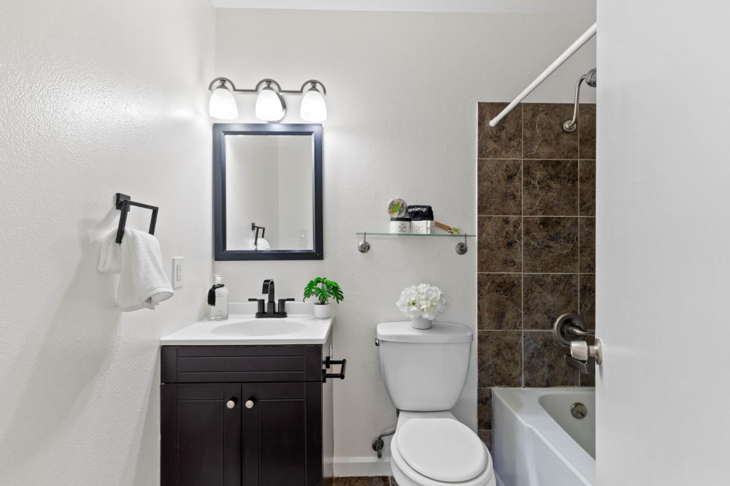 5536 Spinnaker Drive, Unit 3 San Jose, CA 95123 - Photo 21 of 30 a bathroom with a sink toilet and shower