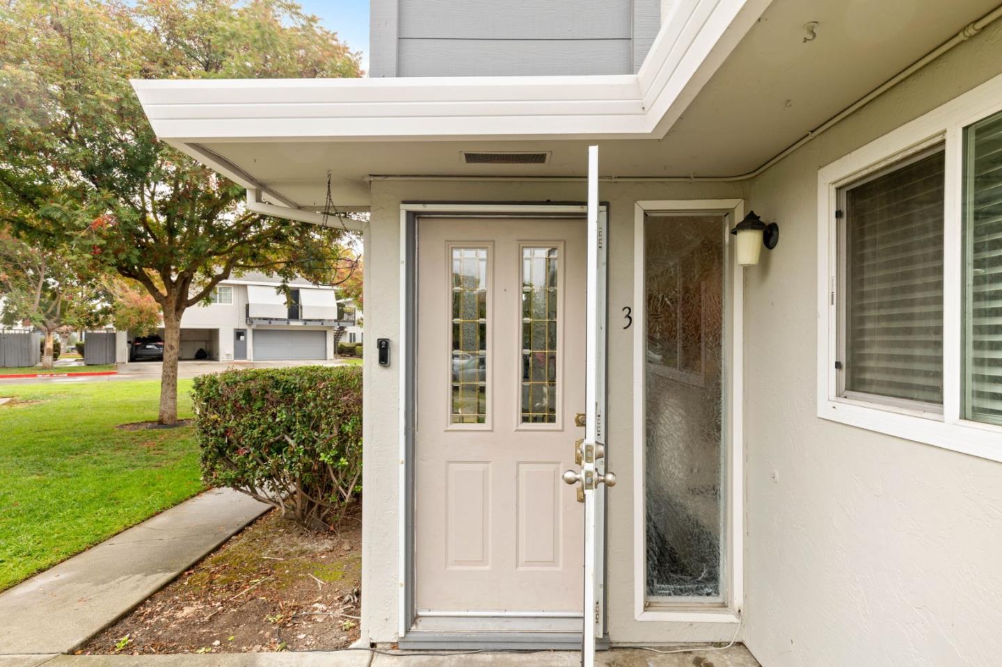 5536 Spinnaker Drive, Unit 3 San Jose, CA 95123 - Photo 5 of 30 a front view of a house with a yard