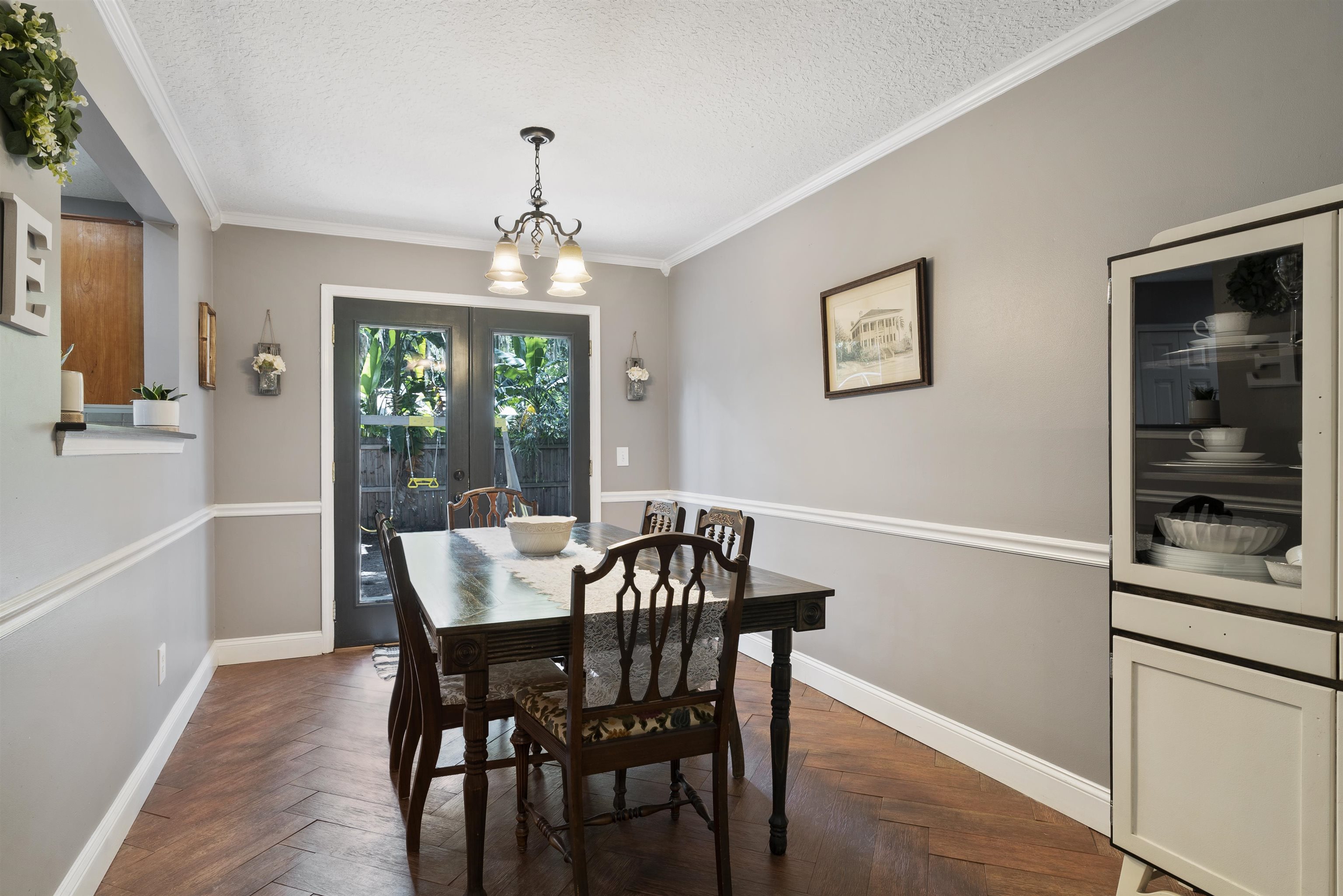 246 Mimosa Road St. Augustine, FL 32086 - Photo 17 of 45 a view of a dining room with furniture window and wooden floor
