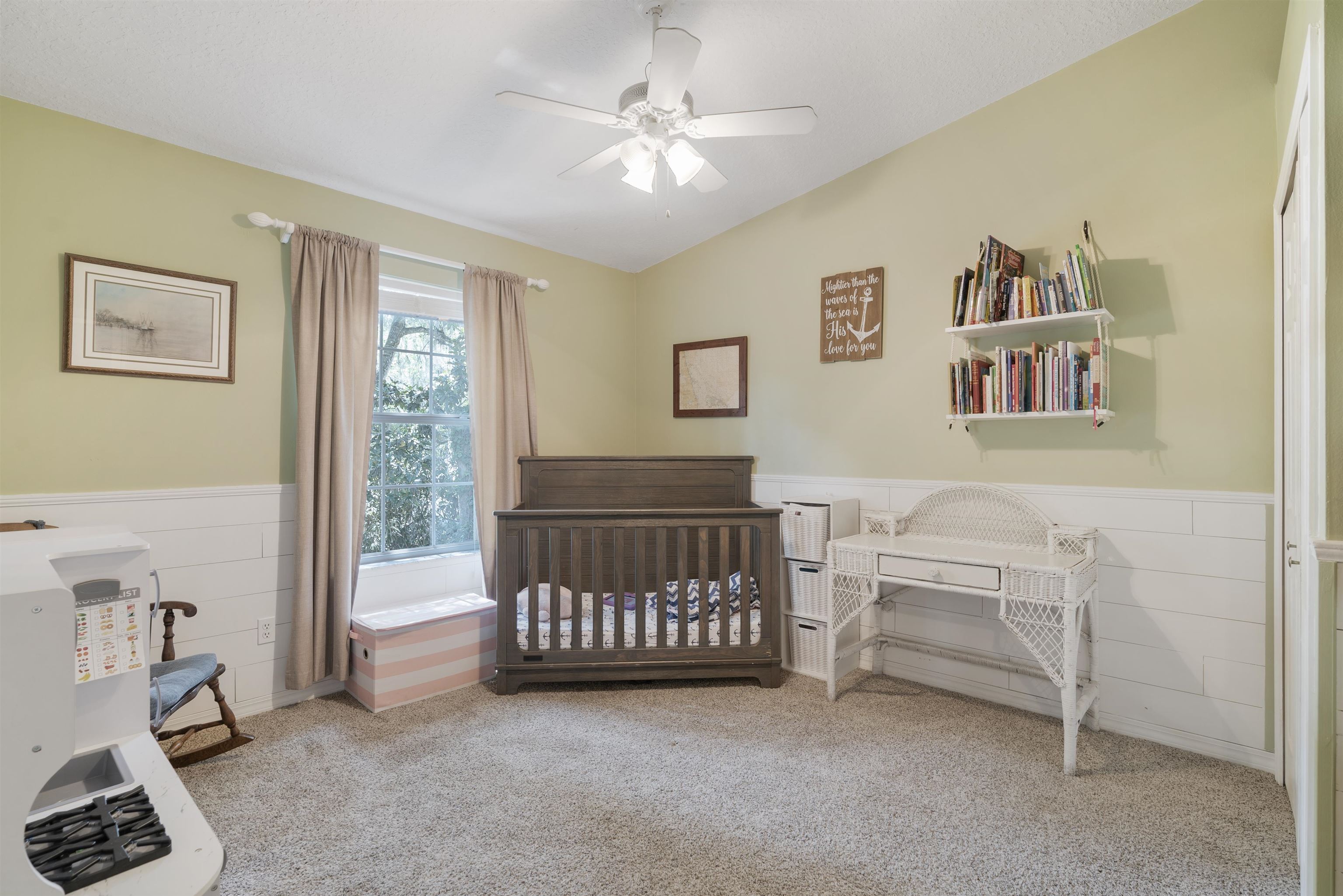 246 Mimosa Road St. Augustine, FL 32086 - Photo 33 of 45 a bedroom with furniture and a window