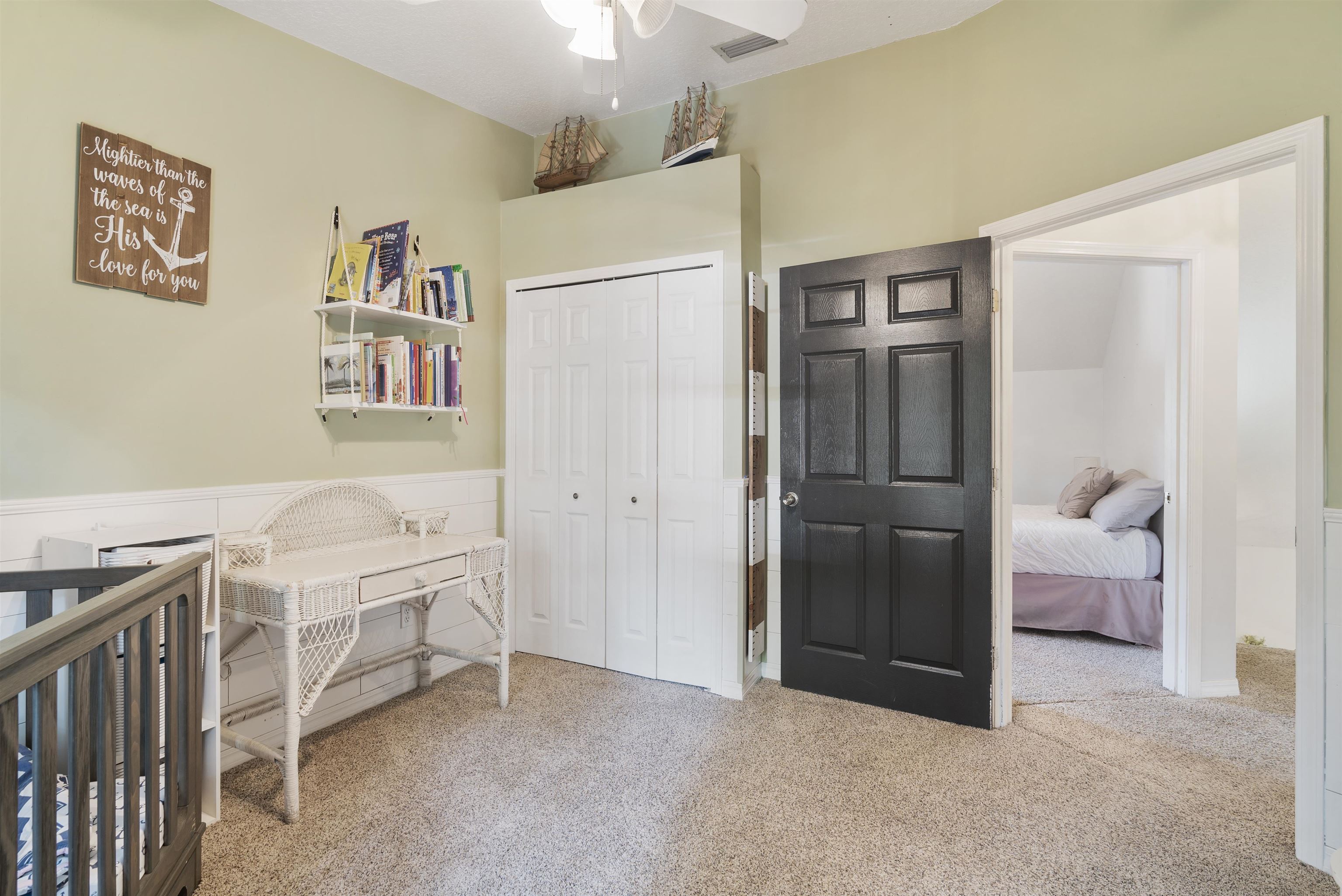 246 Mimosa Road St. Augustine, FL 32086 - Photo 34 of 45 a bedroom with a bed and a cabinets