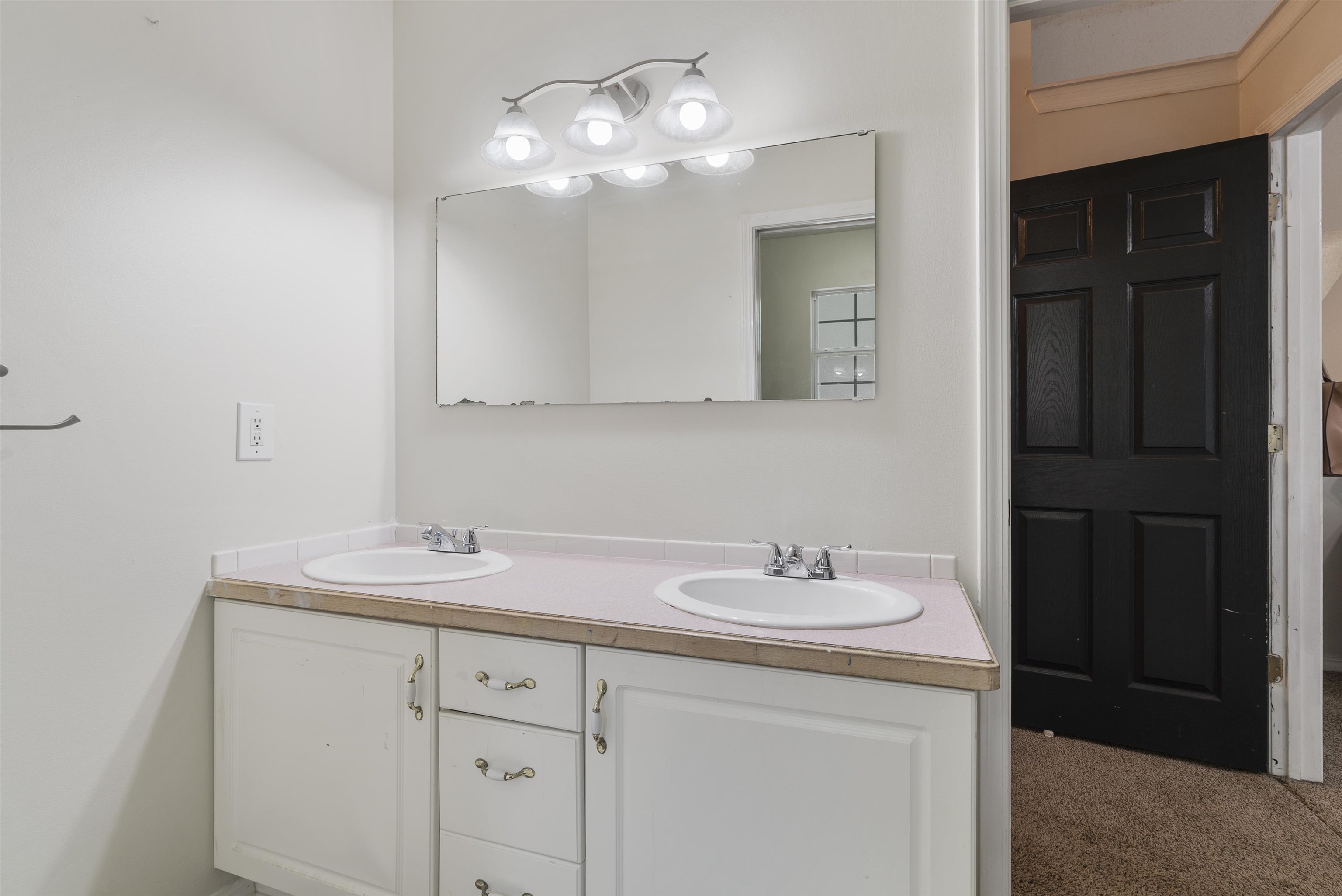 246 Mimosa Road St. Augustine, FL 32086 - Photo 39 of 45 a bathroom with a sink and a mirror