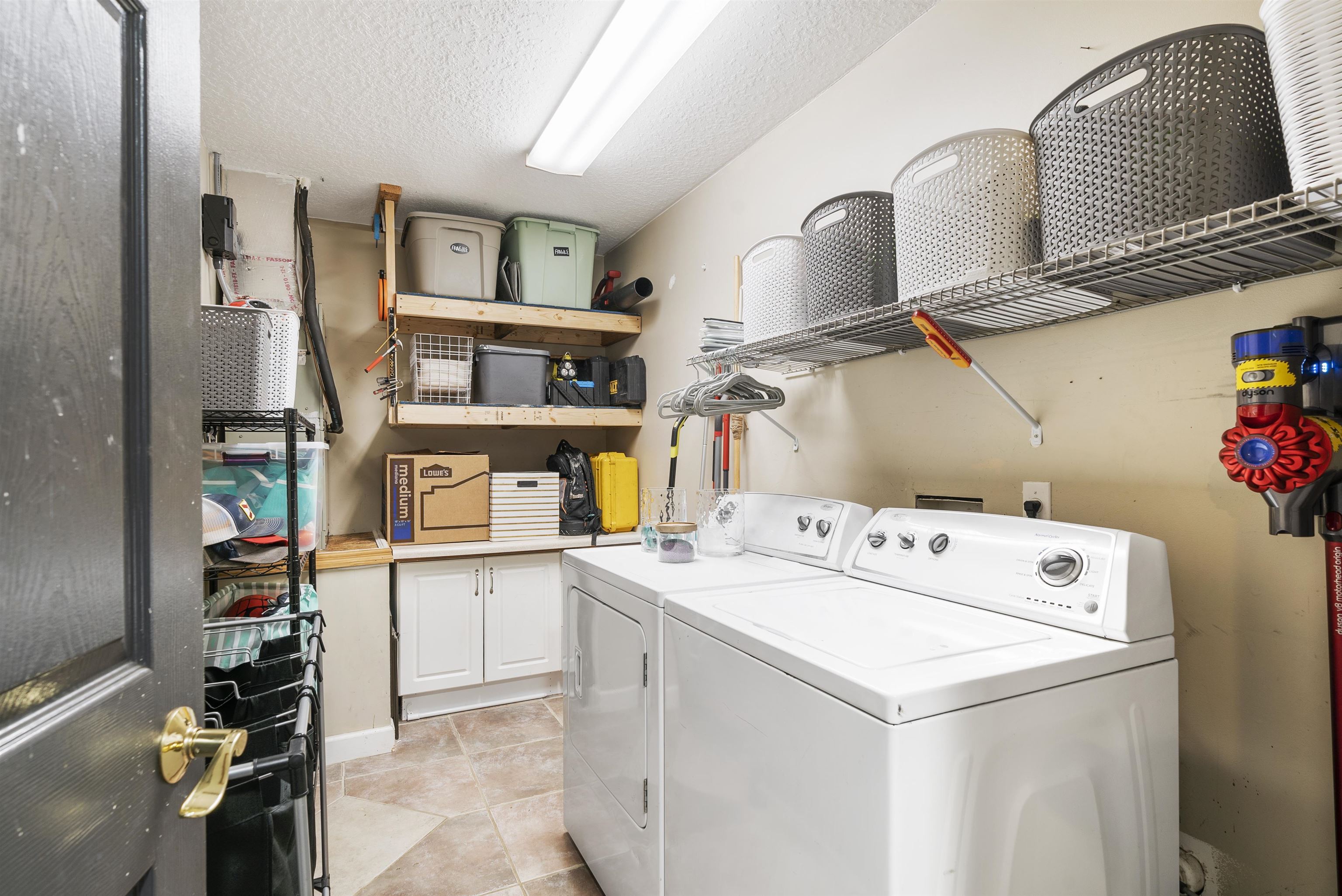 246 Mimosa Road St. Augustine, FL 32086 - Photo 40 of 45 a utility room with dryer and washer