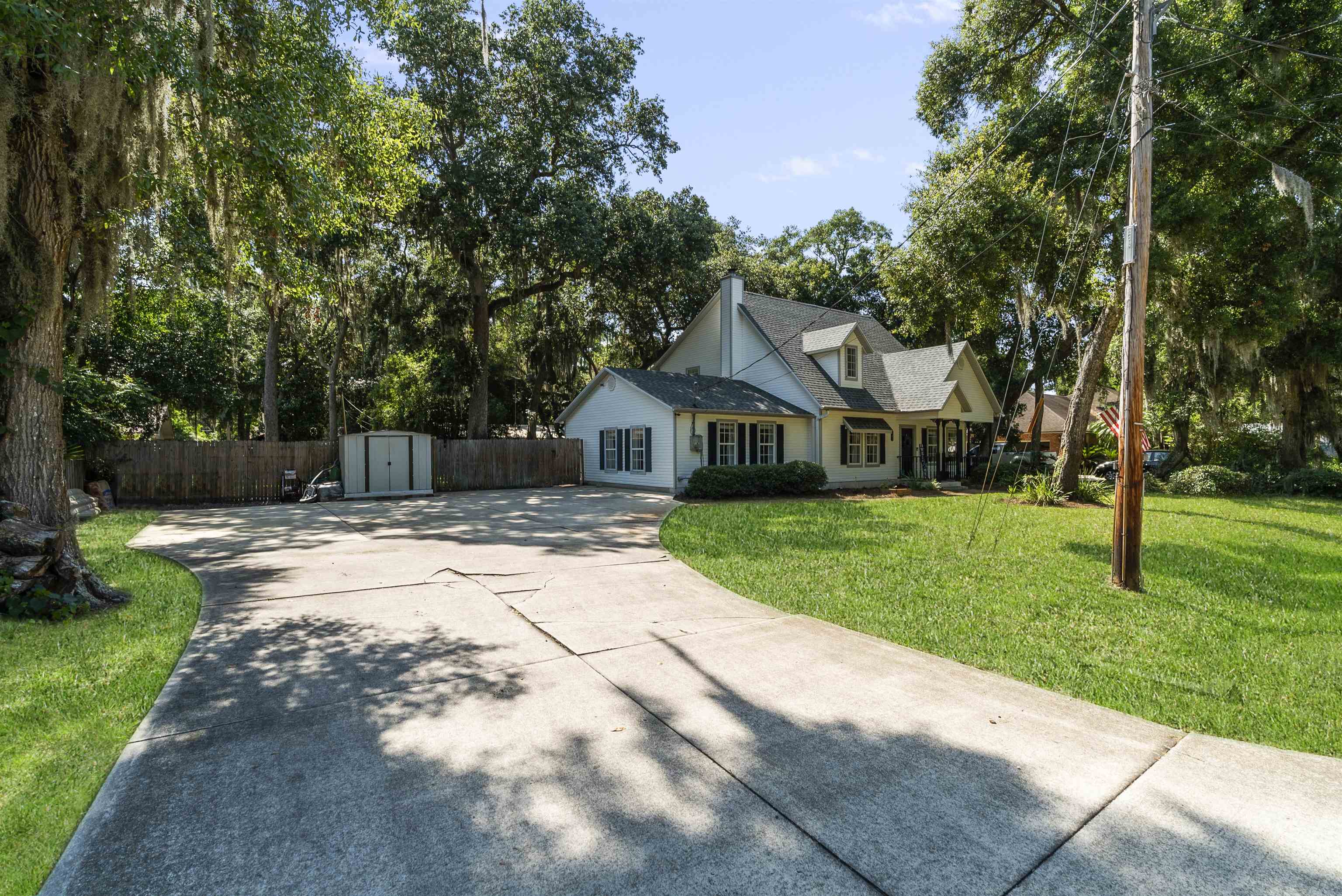 246 Mimosa Road St. Augustine, FL 32086 - Photo 6 of 45 a front view of a house with a yard